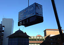 A generator being crained onto a building top and installed for a local council by Enhanced Power Services Ltd